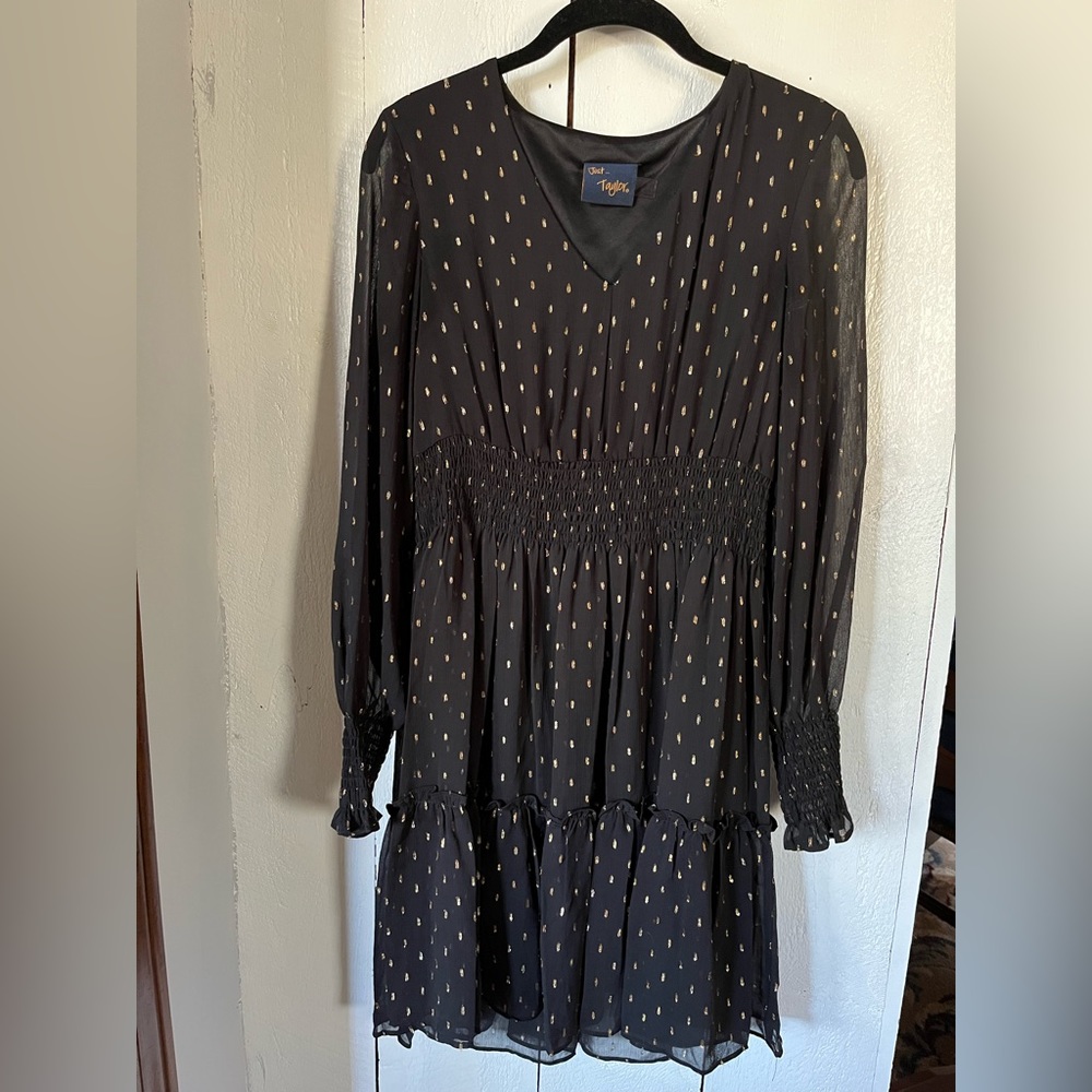 Just Taylor black dress with gold accents.